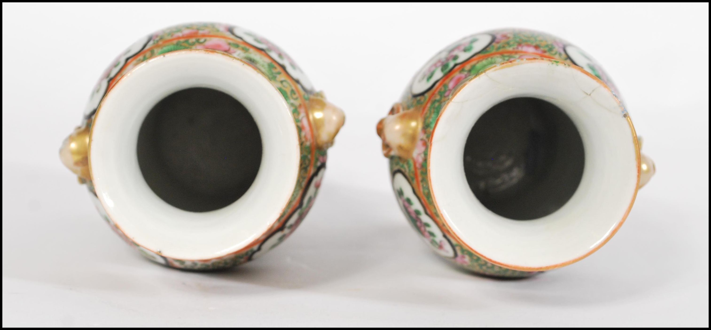 A pair of 19th century Chinese Canton vases.ÿEach of baluster formÿ with waisted necksÿ applied with - Image 4 of 5