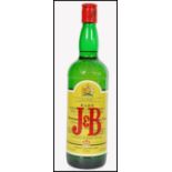 A vintage J&B Justerini & Brooks Ltd blended Scotch whisky 26 2/3 fl.oz / 75.7cl / 70 proof - By