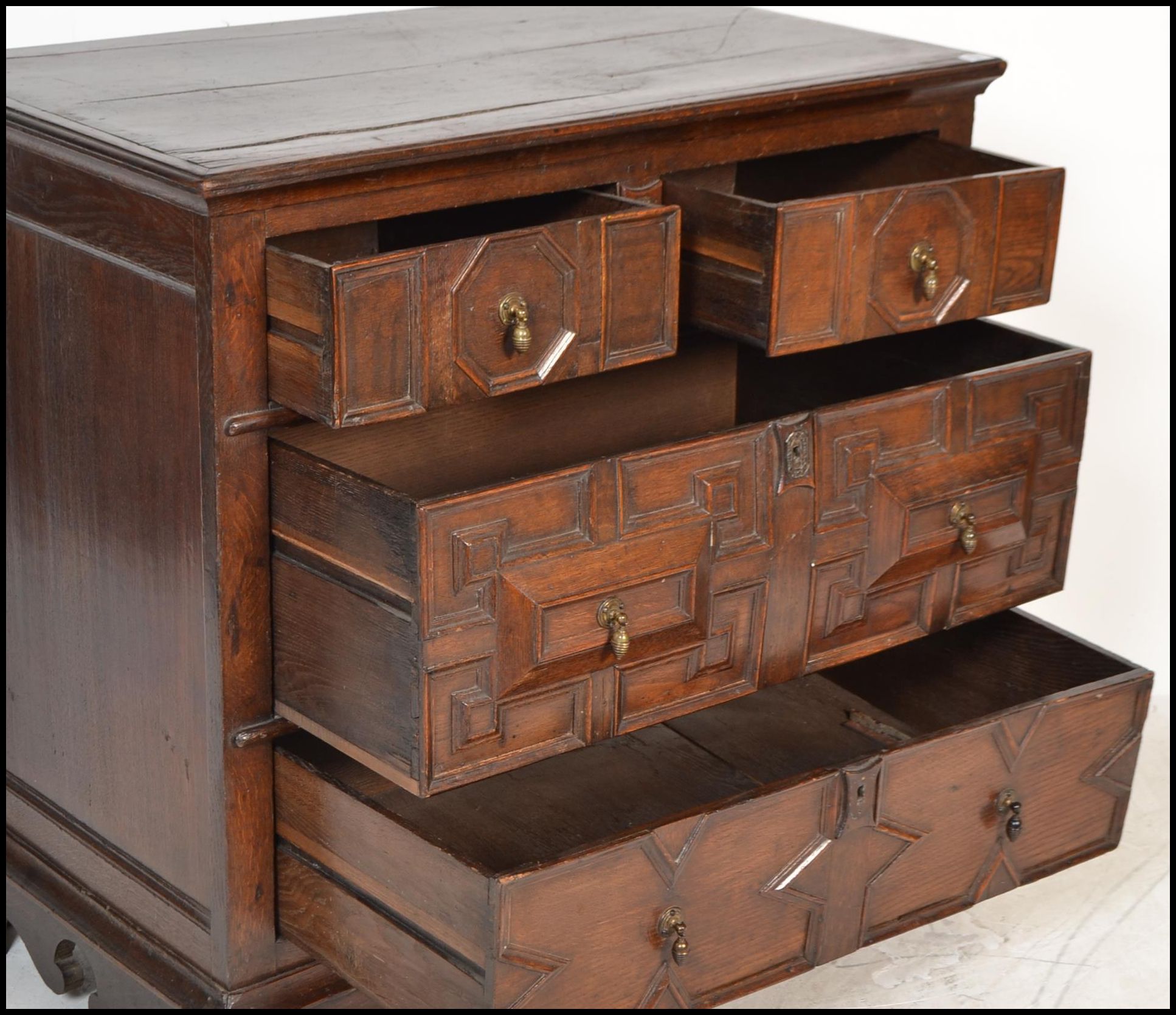 A 17th century Commonwealth oak block fronted chest of drawers. The bank of four drawers having - Image 13 of 16