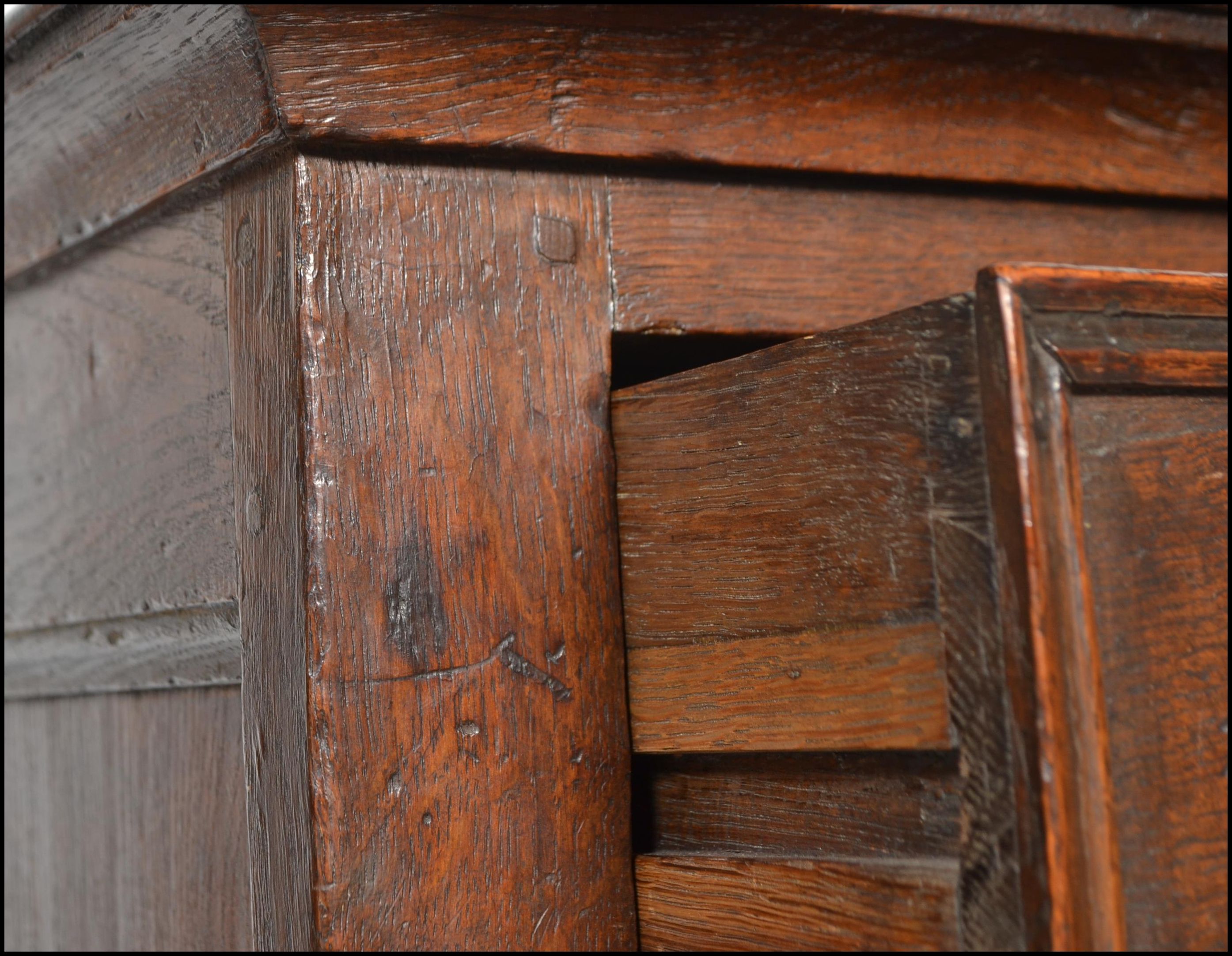 A 17th century Commonwealth oak block fronted chest of drawers. The bank of four drawers having - Image 16 of 16