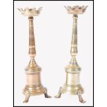 A pair of 17th century white metal / silver plated castle top candlesticks. Each being raised on