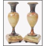 A pair of 19th century Victorian bronze and onyx garniture vases. Raised on bun feet with square