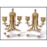 A pair of 19th century Victorian marble and gilt metal ormulu twin branch stub table candelabra.Each