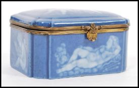 An early 20th Century continental German porcelain blue ceramic casket / trinket box with a pat