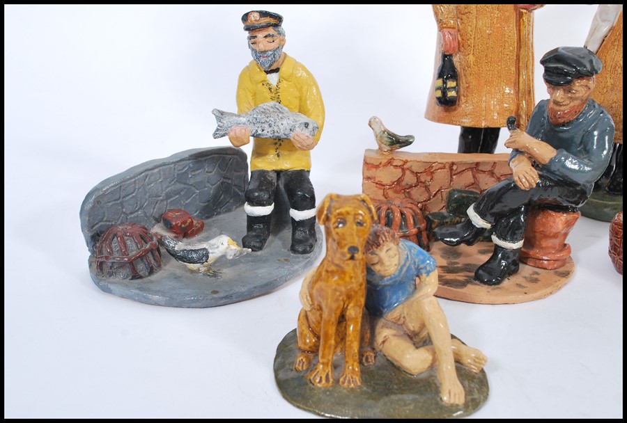 A collection of naive clay pottery figurines being hand painted and glazed in the manner of Royal - Image 5 of 5