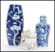 A group of 19th century Chinese ceramics comprising of a tall blue and white prunus pattern vase,