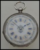 A 19th century Victorian hallmarked silver ladies pocket watch having a white enamel face with