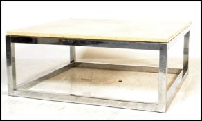 A contemporary large marble and chrome coffee - occasional table. The strapwork chrome base