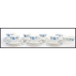 A 20th Century Wedgwood bone china part tea service in the Clementine pattern, having blue floral