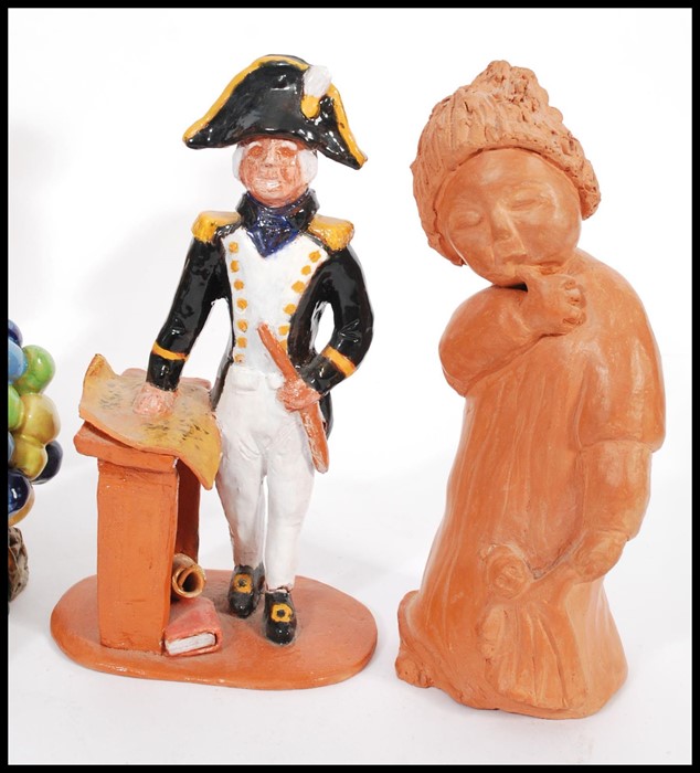 A collection of naive clay pottery figurines being hand painted and glazed in the manner of Royal - Image 2 of 5