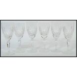 A set of 6 Edinburgh crystal cut glass wine glass having single stems with circular bases and