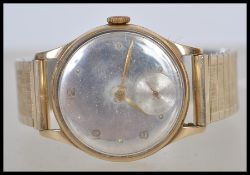 A vintage 20th century hallmarked 9ct gold Omega watch. The movement signed Omega within a 9ct