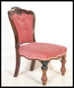 A Victorian 19th century mahogany nursing chair be