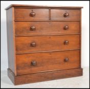 A 19th century Victorian mahogany 2 over 3 chest of drawers. Raised on a plinth base with 2 short