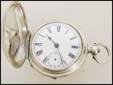A 19th century Victorian silver 935 full hunter pocket watch having a fusee movement. The white
