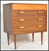 A retro 20th century, circa 1970's teak wood pedestal chest of drawers. Raised on shaped tapering