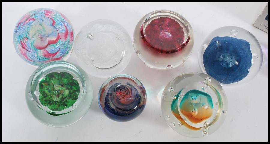 A collection of nine 20th century glass paperweights, the paperweights predominately by Caithness, - Image 3 of 4