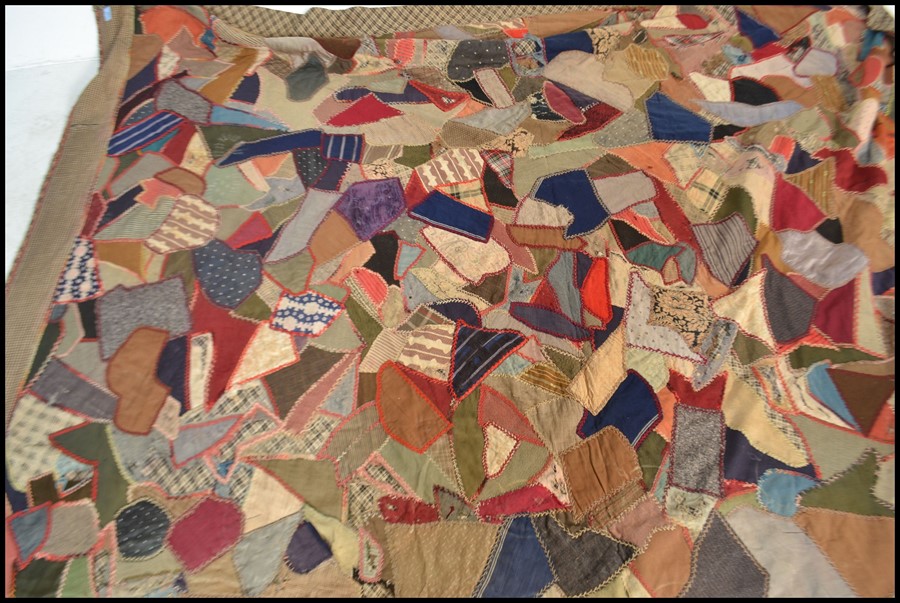 A vintage early 20th century patchwork throw / blanket / bed cover, constructed from various - Image 3 of 5