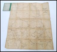 An early 20th Century canvas backed folding pocket road and rail map of the North of England and