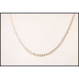 A stamped 375 9gt gold flat linked chain necklace with a lobster clasp. Weight 5.6g.