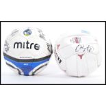 A signed Bristol Rovers F.C. football including signatures from Scott McGleisch and Matt Gill, along