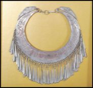 An early 20th Century Thai hill tribe ceremonial silver white metal collar necklace having