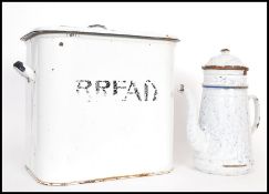 A vintage retro 20th century enamel bread bin along with a French enamel coffee pot. The bread bin