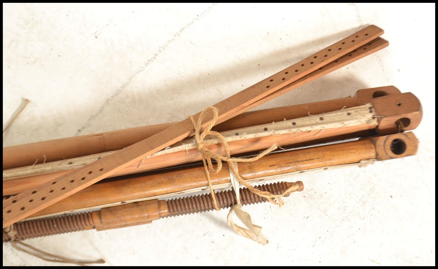 An unusual 20th century tapestry / fabric loom. The batons with pommel heads and strings etc for - Image 3 of 5