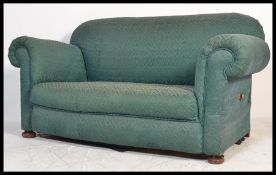 A 19th Century Victorian drop end two seater sofa
