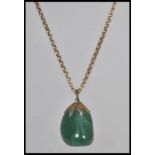 A 20th century 9ct gold  and agate adorned pendant and necklace chain, weight 8.2g.