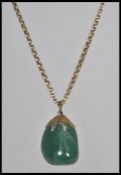 A 20th century 9ct gold  and agate adorned pendant and necklace chain, weight 8.2g.