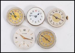 A group of vintage watch movements to include a Garrard with subsidiary dial, example with white