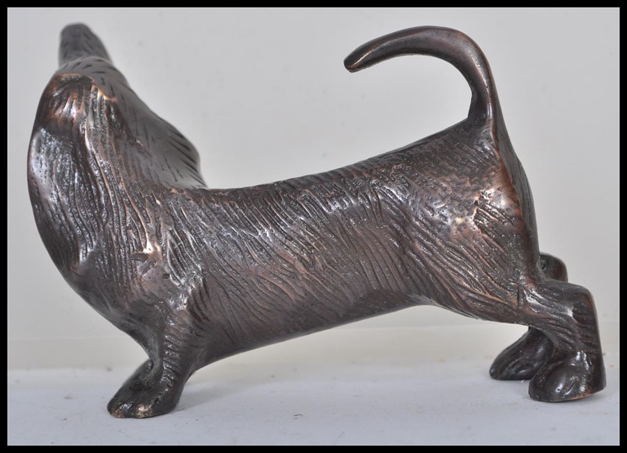 An early 20th century bronze statue figurine of a dachshund sausage dog modelled on all fours with - Image 2 of 4