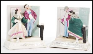 A pair of 19th Century Staffordshire Victorian novelty ceramic fairings / figurines to include one