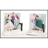 A pair of 19th Century Staffordshire Victorian novelty ceramic fairings / figurines to include one