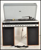 A 20th century Ferguson retro Studio 6 record player /  hi-fi system in a teak finish with acrylic