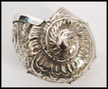 A silver plated vesta case in the form of a shell having a hinged opening. Total weight 18.3g.