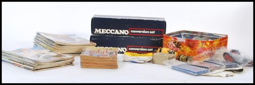 A collection of vintage Meccano magazines dating from the mid 20th Century together with Meccano