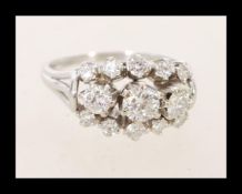A fantastic 18ct white gold thirteen stone diamond