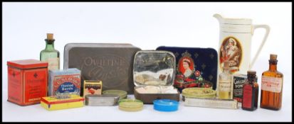 A collection of vintage advertising tins to include a box of unopened Children's Powders,
