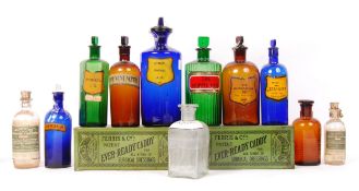 LARGE COLLECTION OF ANTIQUE APOTHECARY CHEMIST MEDICINE JARS AND TINS