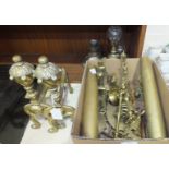 A pair of brass fire dogs, 30cm high, a pair of brass candle sconces and other brassware.