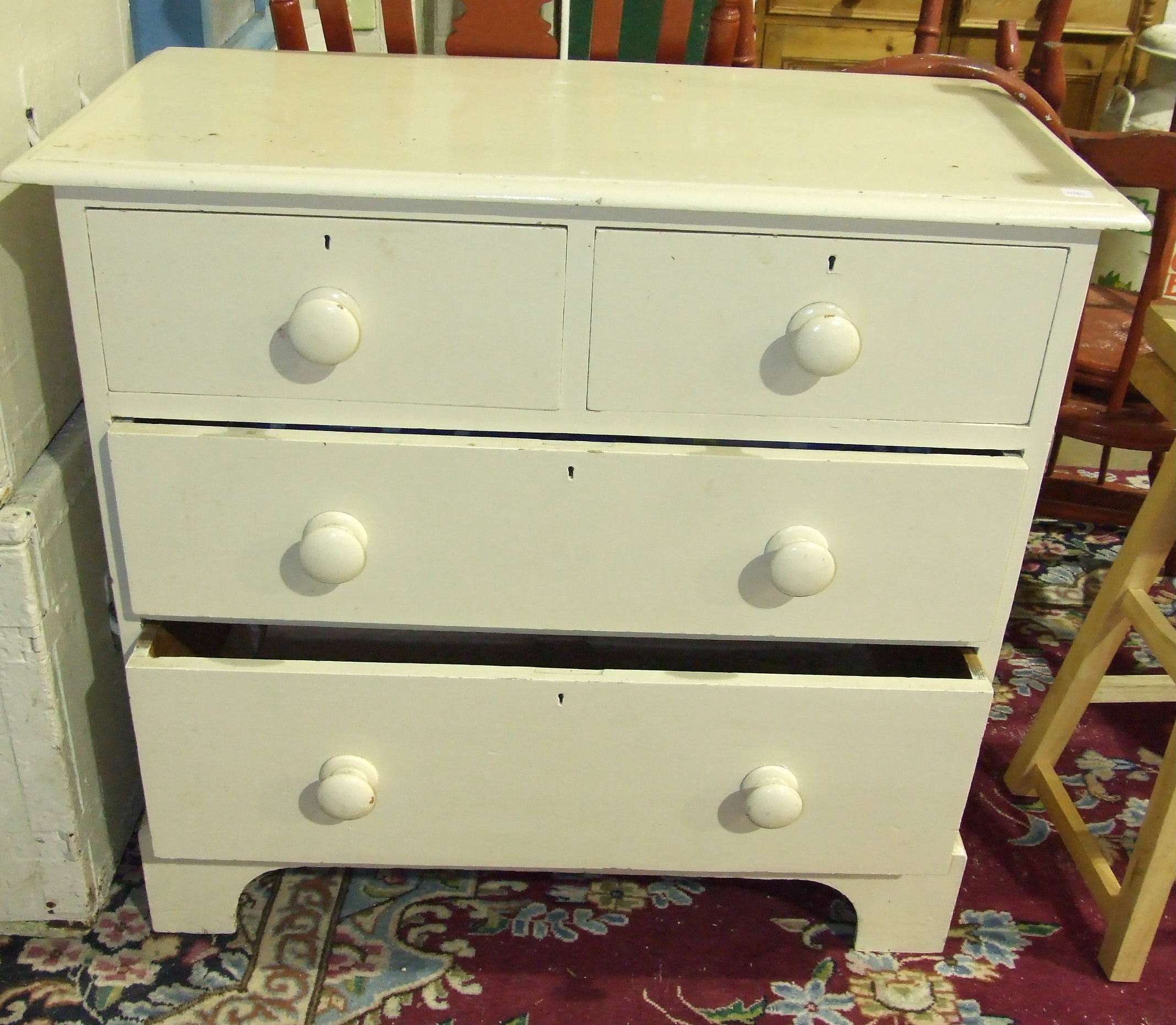 A Victorian painted pine chest of two short and two long drawers, 91cm wide.