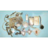 Two silver one-troy ounce ingots, three silver fob medallions, a silver swivel fob and other items,