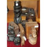 A Black Forest carved wood sitting bear napkin or salt holder, 18cm high, a pair of hardwood book