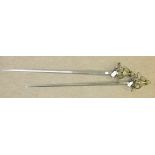 A pair of reproduction brass basket-hilted swords, (2).