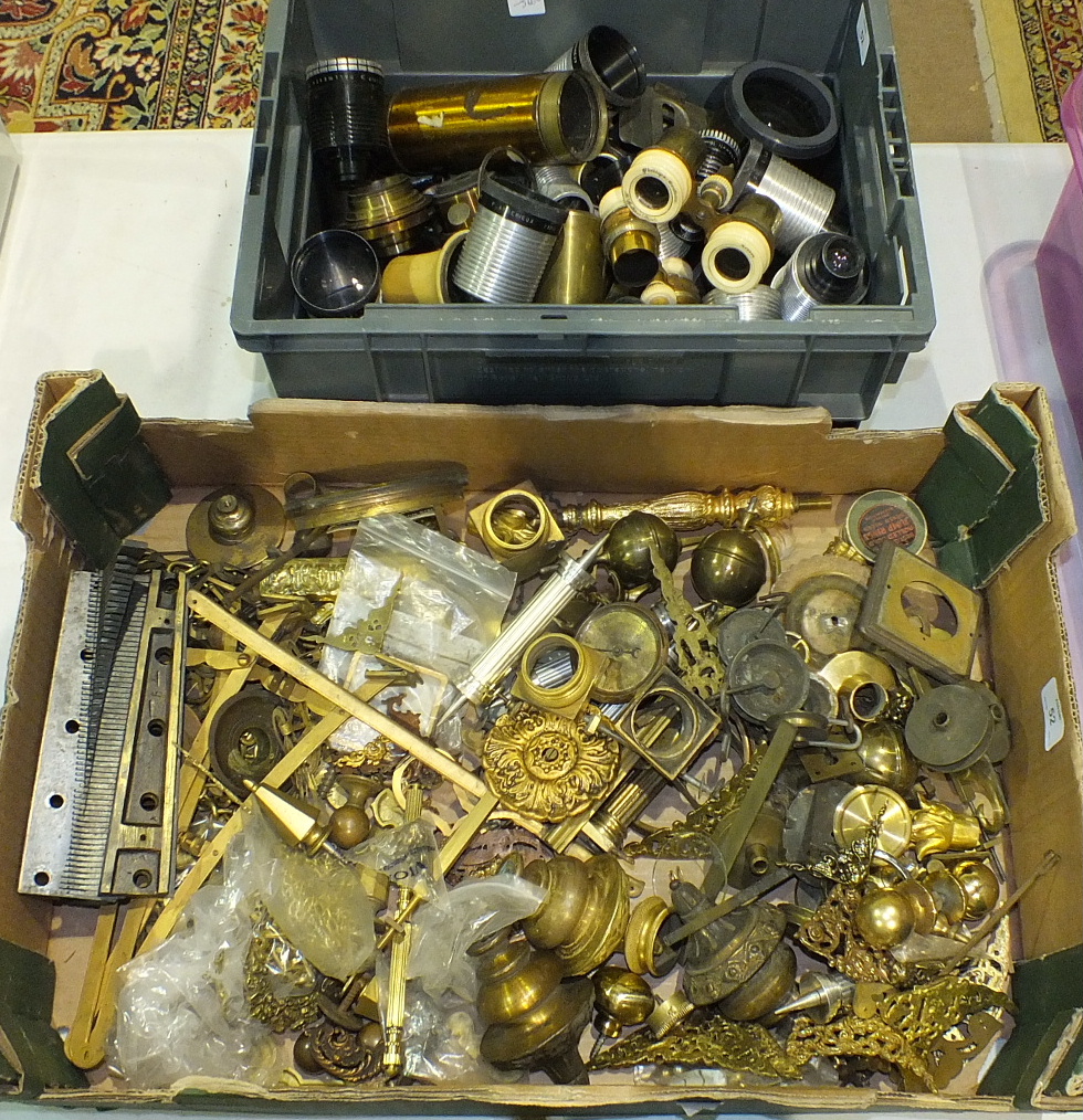 A set of three long case clock brass ball finials, spandrels, other clock furniture and a collection