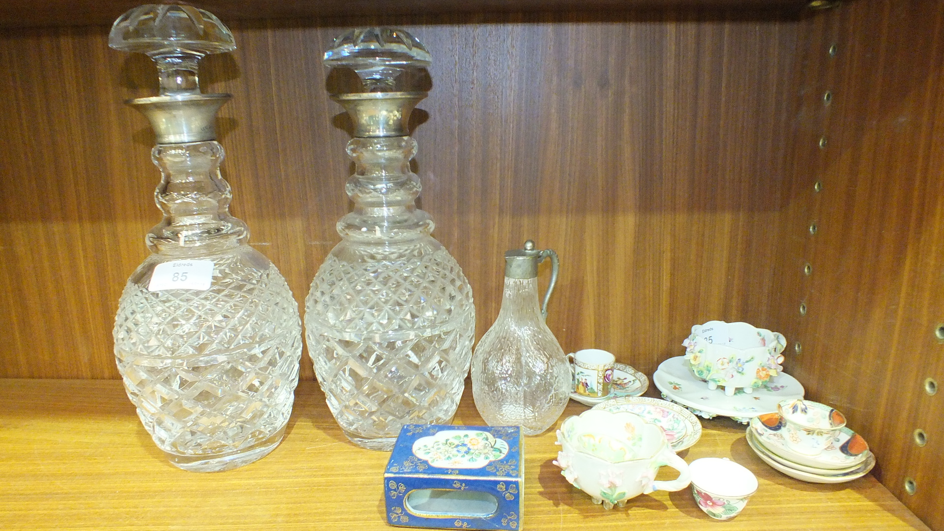 Two silver-mounted cut-glass decanters, (a/f), miniature cups, saucers and other Continental