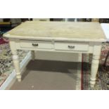 A painted pine two-drawer kitchen table on turned legs, 126 x 86cm.