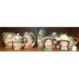 Four Beswick character jugs, Sairey Gamp, Scrooge, Micawber, Tony Weller, a Staffordshire